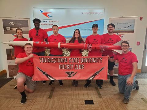 Members of the 2022 YSU Rocket Club pose with their rocket